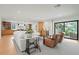 Expansive open-concept space seamlessly connects the living room, bar area, and gourmet kitchen at 1191 Banbury Trl, Maitland, FL 32751
