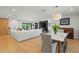 Open concept living and dining room with a modern design and hardwood floors at 1191 Banbury Trl, Maitland, FL 32751