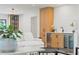 Comfortable living space featuring a wet bar with wine fridge and white countertops at 1191 Banbury Trl, Maitland, FL 32751