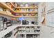 Well-organized pantry with custom shelving, ample counter space and extra storage at 1191 Banbury Trl, Maitland, FL 32751