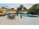 Backyard pool features a lounge area and dining area at 1191 Banbury Trl, Maitland, FL 32751