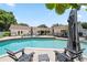 This outdoor oasis features a pool, poolside seating and a dining area perfect for entertaining guests at 1191 Banbury Trl, Maitland, FL 32751
