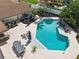 Aerial view of a private pool and patio area, ideal for outdoor entertaining and relaxation at 1191 Banbury Trl, Maitland, FL 32751