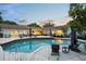Backyard pool area with lounge seating and a dining area at 1191 Banbury Trl, Maitland, FL 32751