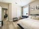 Bright bedroom with natural light, modern furnishings, and closet at 12795 Bosworth Ave, Windermere, FL 34786