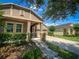 Attractive home exterior featuring a well-maintained lawn and convenient driveway for easy access at 12795 Bosworth Ave, Windermere, FL 34786
