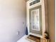 Welcoming front door with decorative glass, stylish accents, and a 'WELCOME' mat at 12795 Bosworth Ave, Windermere, FL 34786