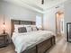 Spacious main bedroom with natural light and an en-suite bathroom at 12795 Bosworth Ave, Windermere, FL 34786