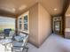 Cozy front porch with comfortable seating and views of the neighborhood at 12795 Bosworth Ave, Windermere, FL 34786