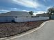 View of the backyard with a white fence enclosing the perimeter at 1354 Knollwood Dr, Davenport, FL 33837