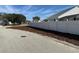 View of the backyard with a white fence enclosing the perimeter at 1354 Knollwood Dr, Davenport, FL 33837