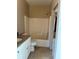Bathroom with a tub and tiled shower surround and a white vanity with a granite countertop at 1354 Knollwood Dr, Davenport, FL 33837