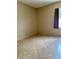 Bedroom with tile floors and a window offering ample natural light at 1354 Knollwood Dr, Davenport, FL 33837
