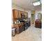 Well-equipped kitchen featuring modern stainless steel appliances, granite countertops, and ample cabinetry at 1354 Knollwood Dr, Davenport, FL 33837