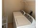 Laundry room with washer and dryer at 1354 Knollwood Dr, Davenport, FL 33837