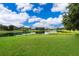 Lush green lawn and lake views, a perfect outdoor space at 1504 E Gore St, Orlando, FL 32806