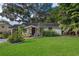 Classic home with a well-maintained lawn and inviting entrance at 1504 E Gore St, Orlando, FL 32806