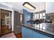 Well-equipped kitchen with stylish cabinetry and granite countertops, ideal for cooking and entertaining at 1504 E Gore St, Orlando, FL 32806