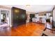 Spacious living room with hardwood floors, offering ample space for entertaining and relaxation at 1504 E Gore St, Orlando, FL 32806