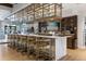 Stylish bar area with seating, elegant decor, and a wide selection of beverages at 1592 Carey Palm Cir, Kissimmee, FL 34747
