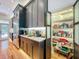Conveniently designed kitchen featuring modern appliances, ample storage, and direct access to the pantry at 1640 Mayfield Ave, Winter Park, FL 32789