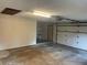 Spacious garage with an automatic door and room for storage at 17836 Palm St, Umatilla, FL 32784
