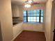 Kitchen breakfast nook featuring a bay window with seating and built-in storage at 17836 Palm St, Umatilla, FL 32784