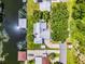Aerial shot showing a home with lush landscaping, and direct water access at 1811 Missouri Ave, Sanford, FL 32771