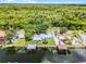 Waterfront property with lush greenery, well-maintained landscaping, and a serene canal at 1811 Missouri Ave, Sanford, FL 32771