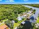 Waterfront community with lush landscaping, boat docks, and charming homes along the water at 1811 Missouri Ave, Sanford, FL 32771