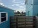 Backyard area featuring a partially fenced yard with view of neighborhood and sky at 1811 Missouri Ave, Sanford, FL 32771