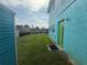A well kept grassy lawn in the backyard with a view of the lake at 1811 Missouri Ave, Sanford, FL 32771
