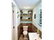 Bathroom featuring stylish decor, decorative accents, and neutral-toned walls, offering a warm ambiance at 1811 Missouri Ave, Sanford, FL 32771