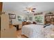 Bright bedroom features wood floors and multiple windows at 1811 Missouri Ave, Sanford, FL 32771
