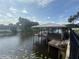 Picturesque dock on the water with a covered boat lift at 1811 Missouri Ave, Sanford, FL 32771