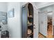 Hallway with a decorative shelving unit and a unique vault door at 1811 Missouri Ave, Sanford, FL 32771