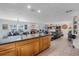 Open-concept living space with tile floors and a fireplace at 1811 Missouri Ave, Sanford, FL 32771