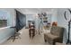 Well-lit studio space with various lighting equipment, a desk, and a comfortable chair at 1811 Missouri Ave, Sanford, FL 32771