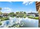 Scenic canal view showcasing multiple docks, boat lifts, and well-manicured waterfront properties at 1811 Missouri Ave, Sanford, FL 32771