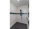 Modern bathroom with a tile shower, sleek fixtures, and an efficient design; elegant at 1845 Springhead Dr, Deltona, FL 32725
