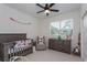 Sweet Bedroom with baby furniture, soft lighting, and a cozy atmosphere; perfect for little ones at 1845 Springhead Dr, Deltona, FL 32725