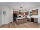 Modern kitchen with a central island, stainless steel appliances, and stylish cabinetry at 1845 Springhead Dr, Deltona, FL 32725