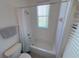 Bathroom with tub and shower combination at 204 Birkdale St, Davenport, FL 33897