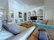 Bright living room with high ceilings, recessed lighting, and comfortable couches offers a relaxing atmosphere at 204 Birkdale St, Davenport, FL 33897