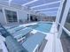 Inviting screened-in pool with lounge chairs at 204 Birkdale St, Davenport, FL 33897