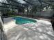 Screened-in private pool with a large pool deck, ideal for outdoor gatherings at 2131 Kaylas Ct, Orlando, FL 32817