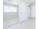 Bright bedroom featuring sliding closet doors and white trim at 226 Palmyra Dr, Orlando, FL 32807