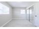 Bright bedroom with ample natural light, a closet, and tile floors at 226 Palmyra Dr, Orlando, FL 32807