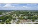 Aerial view of a residential area and well-maintained neighborhood surrounded by mature trees at 226 Palmyra Dr, Orlando, FL 32807