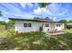 Freshly painted home with a well maintained lawn, and new landscaping and mulch along the front at 226 Palmyra Dr, Orlando, FL 32807